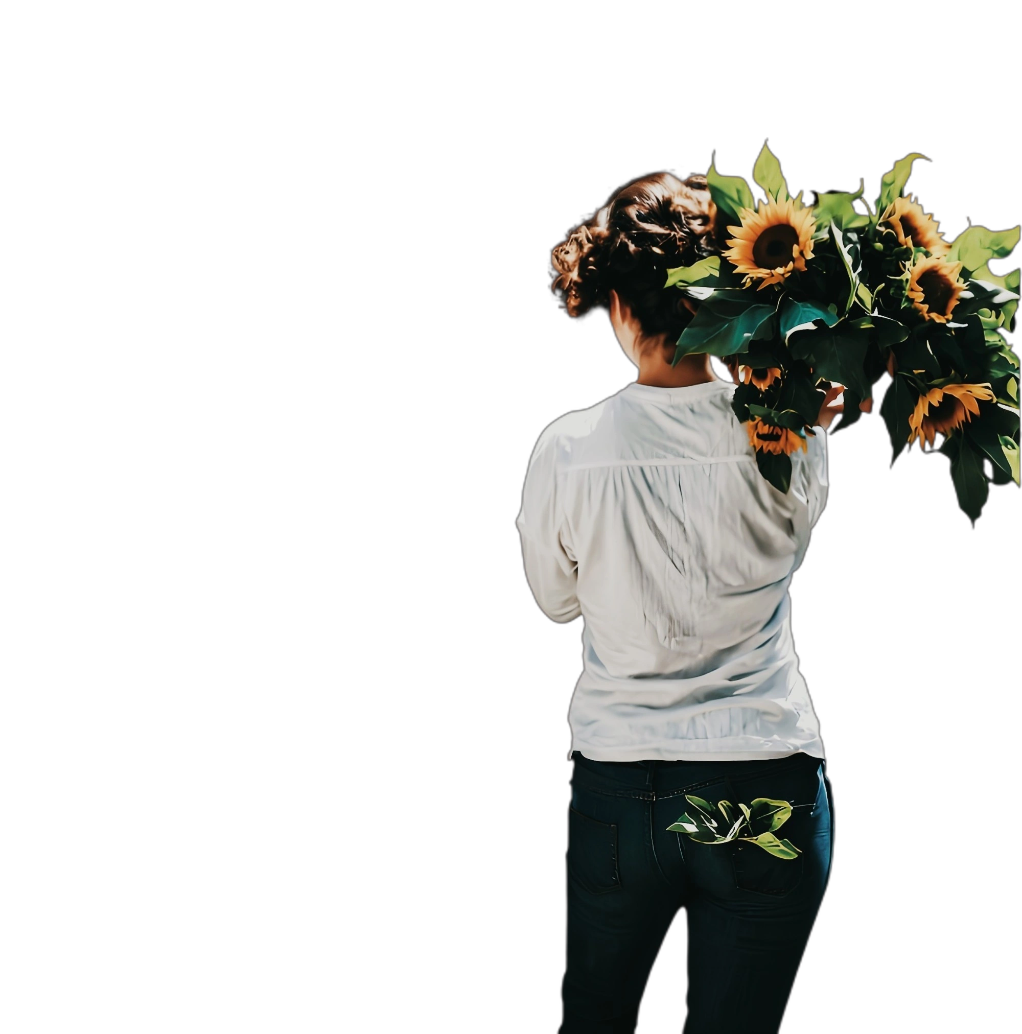 Nadine, fondatrice de Couleurs d'Aurore, avec une récolte de tournesols